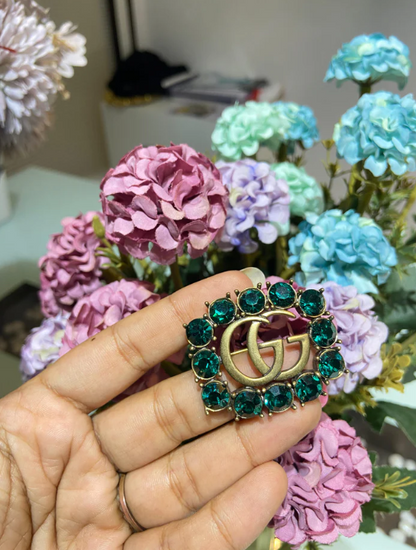 GG stone brooch