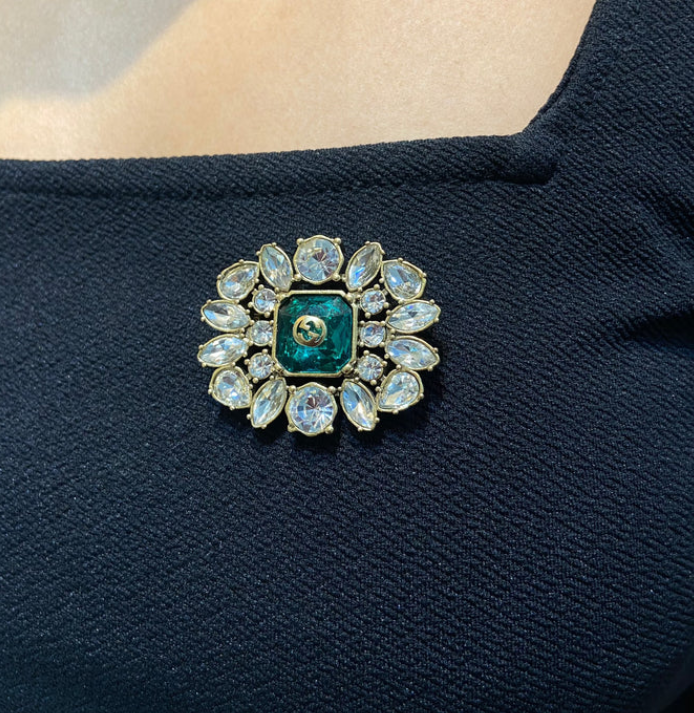 GG crystal brooch